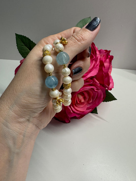 Pearl and aquamarine with gold charms